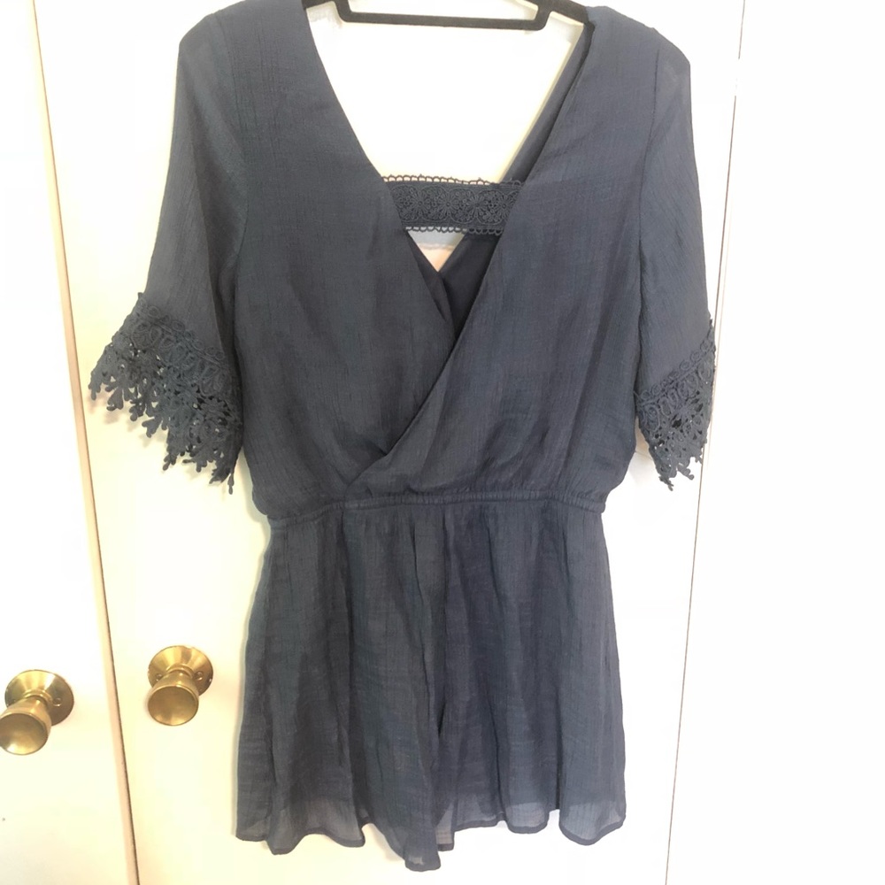 Dark blue top. Onetheland